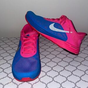 Blue and pink Nike shoes